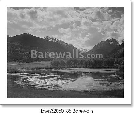Lake and trees in foreground, mountains and clouds in background, "In Rocky Mountain National Park,"Colorado.  Photographs of National Parks and Monuments, compiled 1941 - 1942, documenting the period ca. 1933 - 1942 by Ansel Adams (1902-1984), Art Print