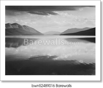 Looking across lake toward mountains, "Evening, McDonald Lake, Glacier National Park," Montana.  Photographs of National Parks and Monuments, compiled 1941 - 1942, documenting the period ca. 1933 - 1942 by Ansel Adams (1902-1984), Art Print