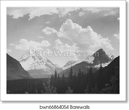 Looking across forest to mountains and clouds, "In Glacier National Park," Montana.  Photographs of National Parks and Monuments, compiled 1941 - 1942, documenting the period ca. 1933 - 1942 by Ansel Adams (1902-1984), Art Print