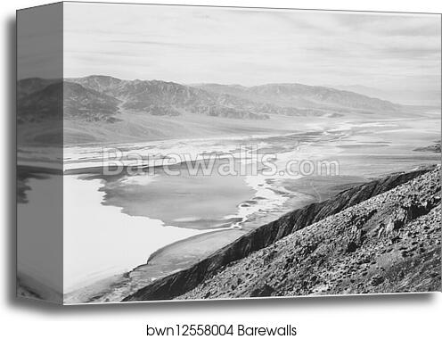 Looking across desert toward mountains, "Death Valley National Monument," California.  Photographs of National Parks and Monuments, compiled 1941 - 1942, documenting the period ca. 1933 - 1942 by Ansel Adams (1902-1984), Canvas Print