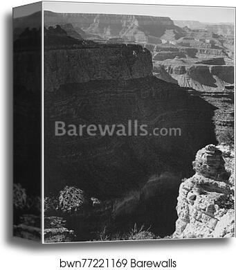 View of darkly shadowed canyon at left and center, from the "South Rim, 1941, Grand Canyon National Park," Arizona. (vertical orientation).  Photographs of National Parks and Monuments, compiled 1941 - 1942, documenting the period ca. 1933 - 1942 by Ansel Adams (1902-1984), Canvas Print