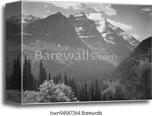 Valley, snow covered mountains in background, "In Glacier National Park," Montana.  Photographs of National Parks and Monuments, compiled 1941 - 1942, documenting the period ca. 1933 - 1942 by Ansel Adams (1902-1984), Canvas Print