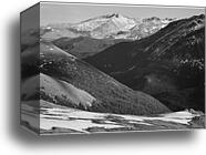 Close in view, dark shadowed hills in foreground, mountains in background, "Long's Peak, Rocky Mountain National Park," Colorado.  Photographs of National Parks and Monuments, compiled 1941 - 1942, documenting the period ca. 1933 - 1942 by Ansel Adams (1902-1984), Canvas Print